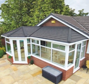 White uPVC conservatory with a replacement tiled roof, an upgrade for conservatories in Crawley